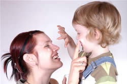 mother and son moisturizing